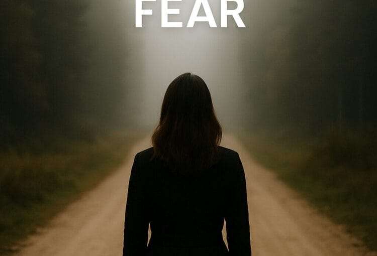 A woman stands at the start of a foggy forest path, facing forward with quiet strength. The words “Overcoming Fear” appear above, symbolizing courage, reflection, and readiness for change.